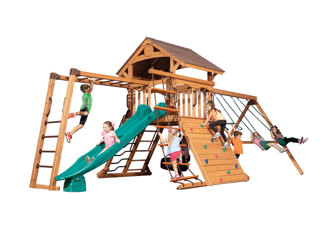 Adventure Summit XL 2 playset: Wooden playset with slide, swings, rock wall, and monkey bars—perfect for backyard fun.