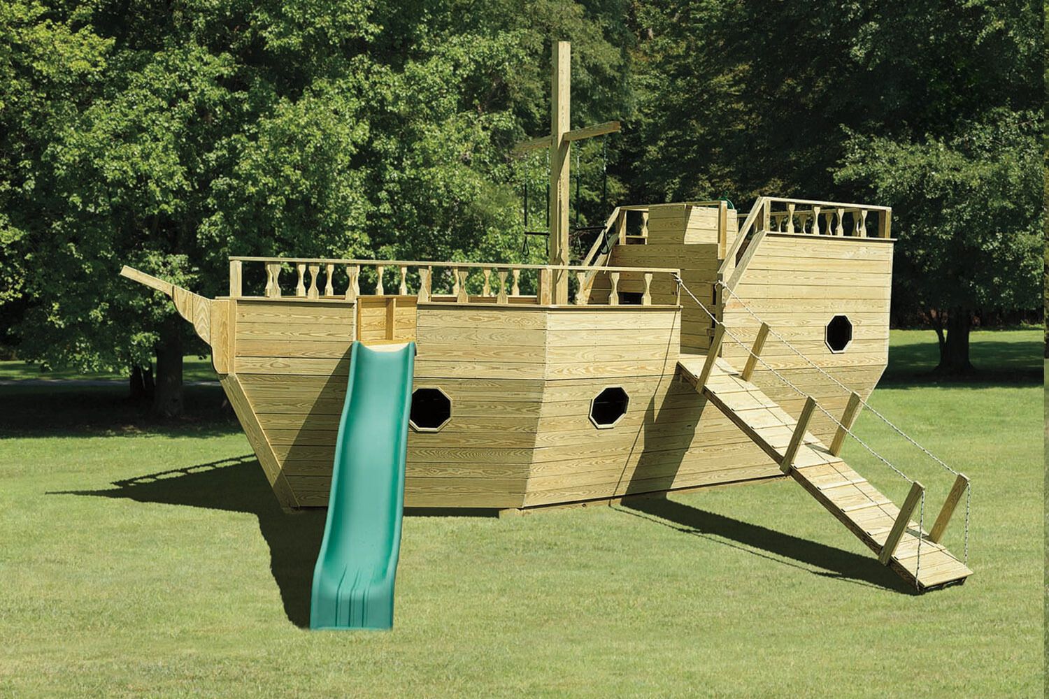 Large wooden pirate ship playset with slide and climbing bridge, perfect for backyard fun.