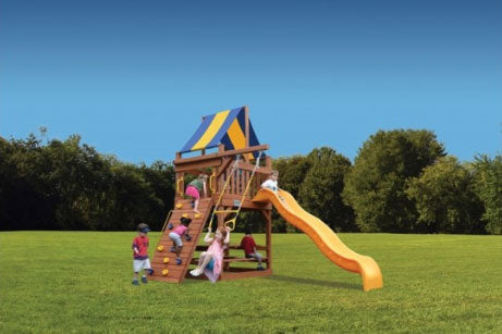 Original Fort Jr. (40A) wooden playset with slide, climbing wall, and canopy; perfect for backyard fun.