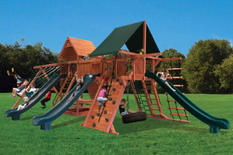 Supreme Dual Triple Shot (36A) wooden playset with slides, climbing wall, swings, and shade canopy.