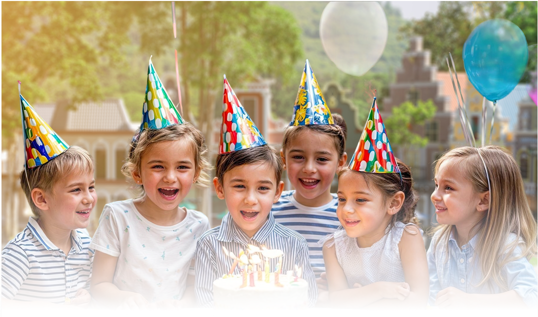Six children in colorful party hats gathered around a birthday cake with lit candles