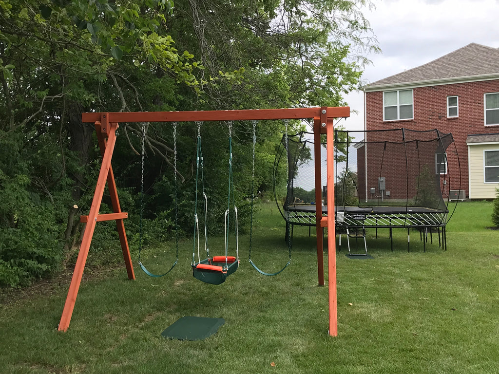 Classic Swing Gym:  Outdoor wooden swing set with three swings, ideal for backyard fun.
