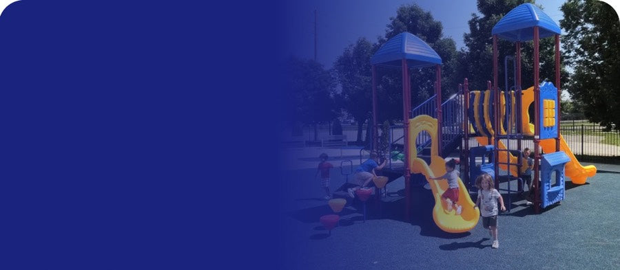 Children playing on a blue and yellow community playground